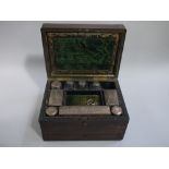 A Victorian rosewood dressing and jewellery case (at fault),