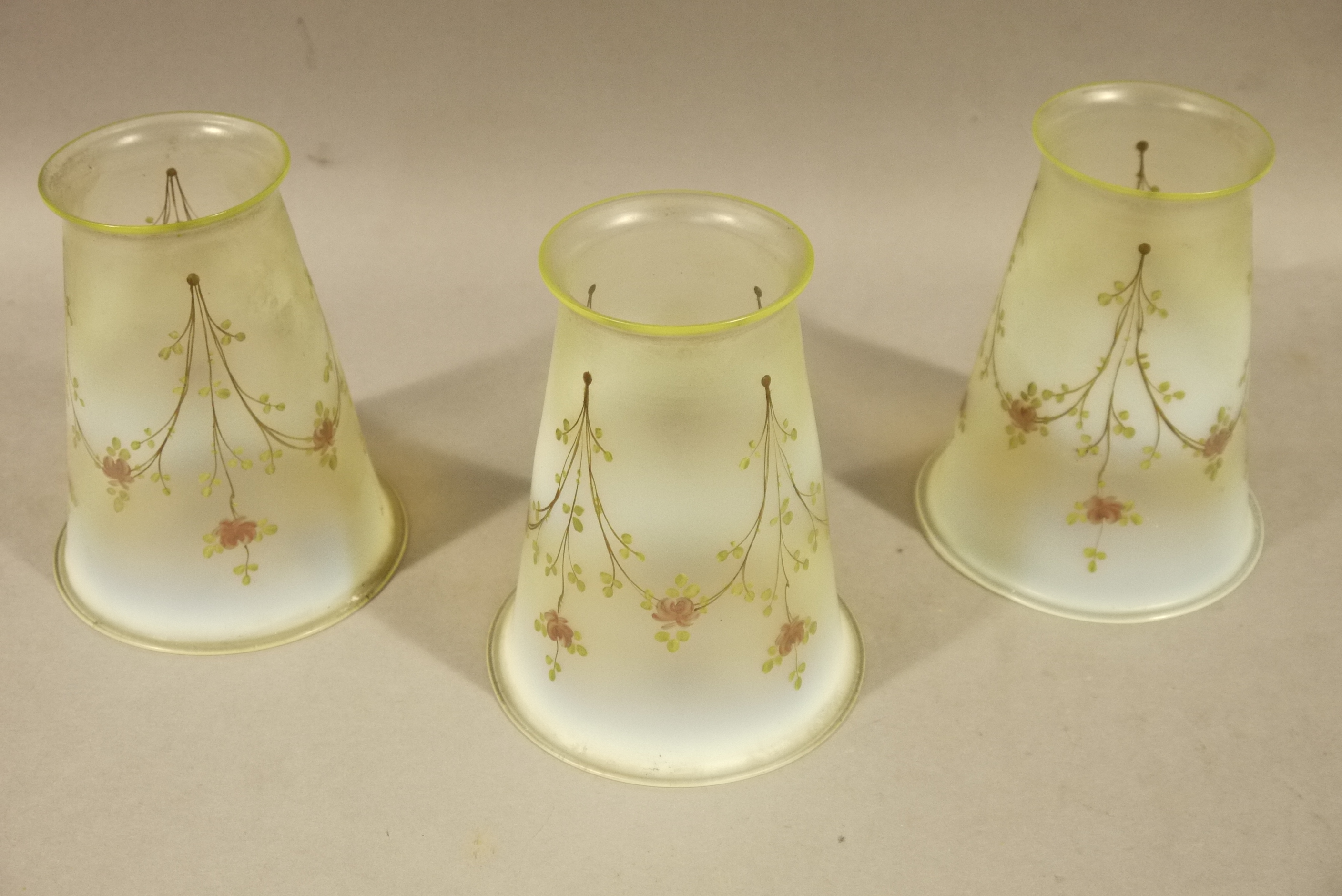 A set of three Victorian/Edwardian vaseline glass light shades of tapered cylindrical outline hand - Image 2 of 2