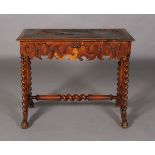 A Victorian oak single drawer writing table with inset leather writing surface (af),