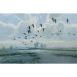 By and after Peter Scott (1909-1989) Geese in flight over wetlands, colour print,