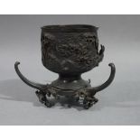 An unusual Japanese bronze vase of cylindrical cup shape relief cast with dragons and flaming pearl,