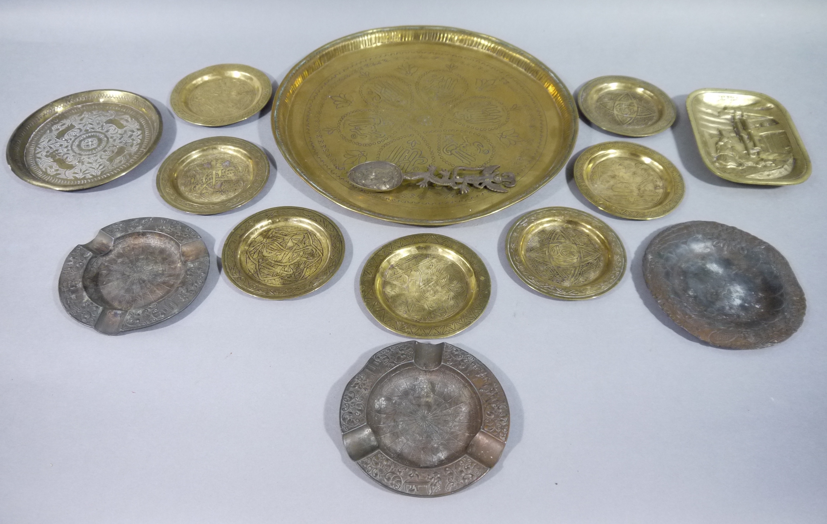 An Eastern engraved, circular brass tray, 31.