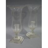 A pair of Edward VII wheel engraved glass storm lights of waisted urnular form,