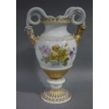 A Meissen porcelain urnular vase with pair of rising interlaced serpent handles,