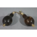 A pair of late Victorian/Edwardian rosewood and bone pendant light switches, of baluster outline,