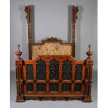 A Victorian oak bedstead,