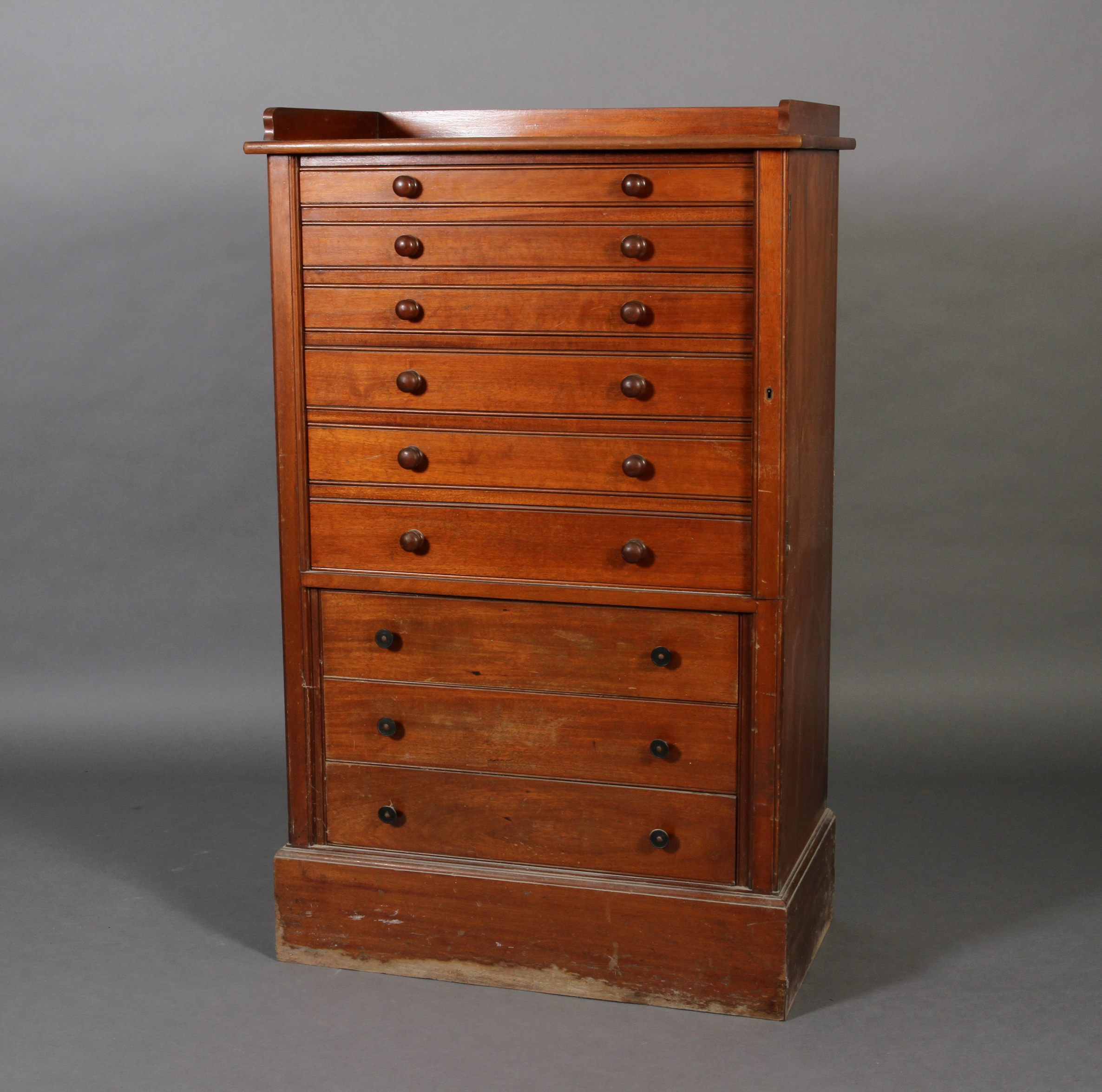A late Victorian mahogany Wellington chest by Armstrongs Ltd.