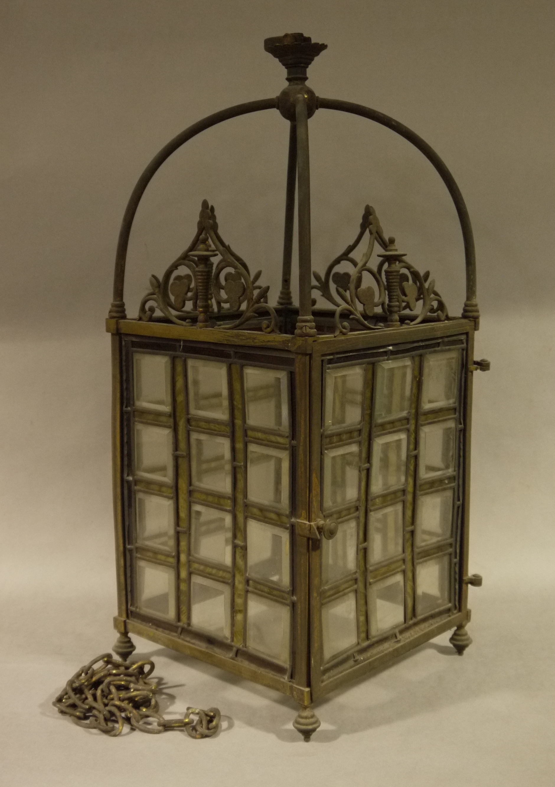 A late 19th century gilt metal, clear and colour beaded glass lantern, of square outline,