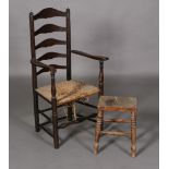 A 19th century elm ladder back elbow chair,