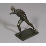 After the Antique - a classical male figure, naked, rectangular base, 34cm high,