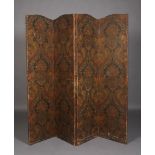 An early 20th century three fold draught screen of embossed leather effect panels,