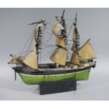 A small wooden model of the ship 'Bounty',