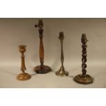 Three wooden table lamps of turned,