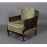 An early 20th century mahogany and double bergere caned armchair of Adam style,