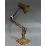 A Herbert Terry gilt metal anglepoise lamp c.