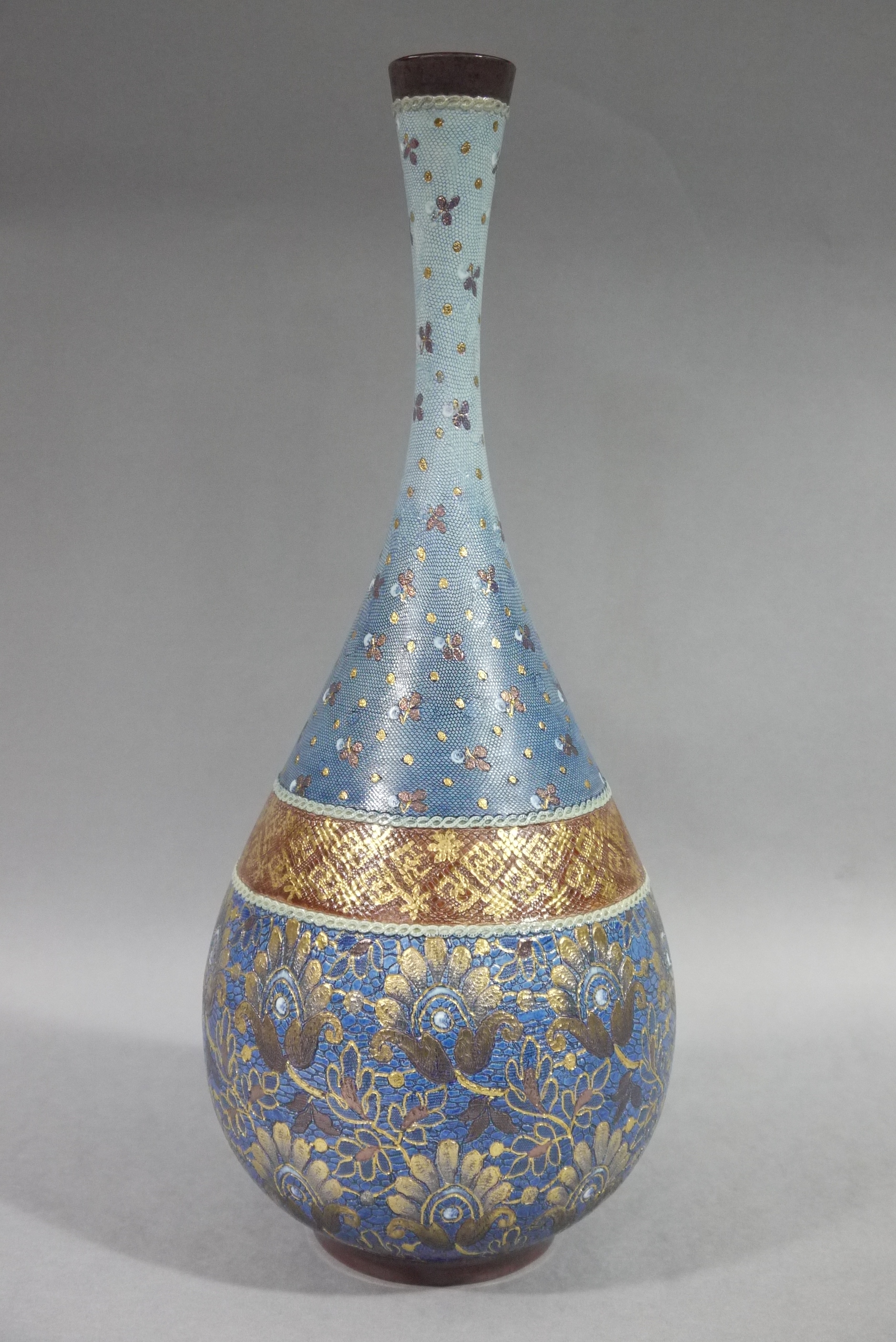 A Doulton Slaters patent chiné gilt vase with tall waisted neck,