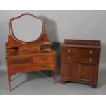 An Edward VII mahogany dressing table, outlined with boxwood stringing and barber pole inlay,