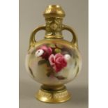 A Royal Worcester two handled vase painted with red and pink roses,