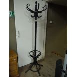 A black bentwood hat and coat stand