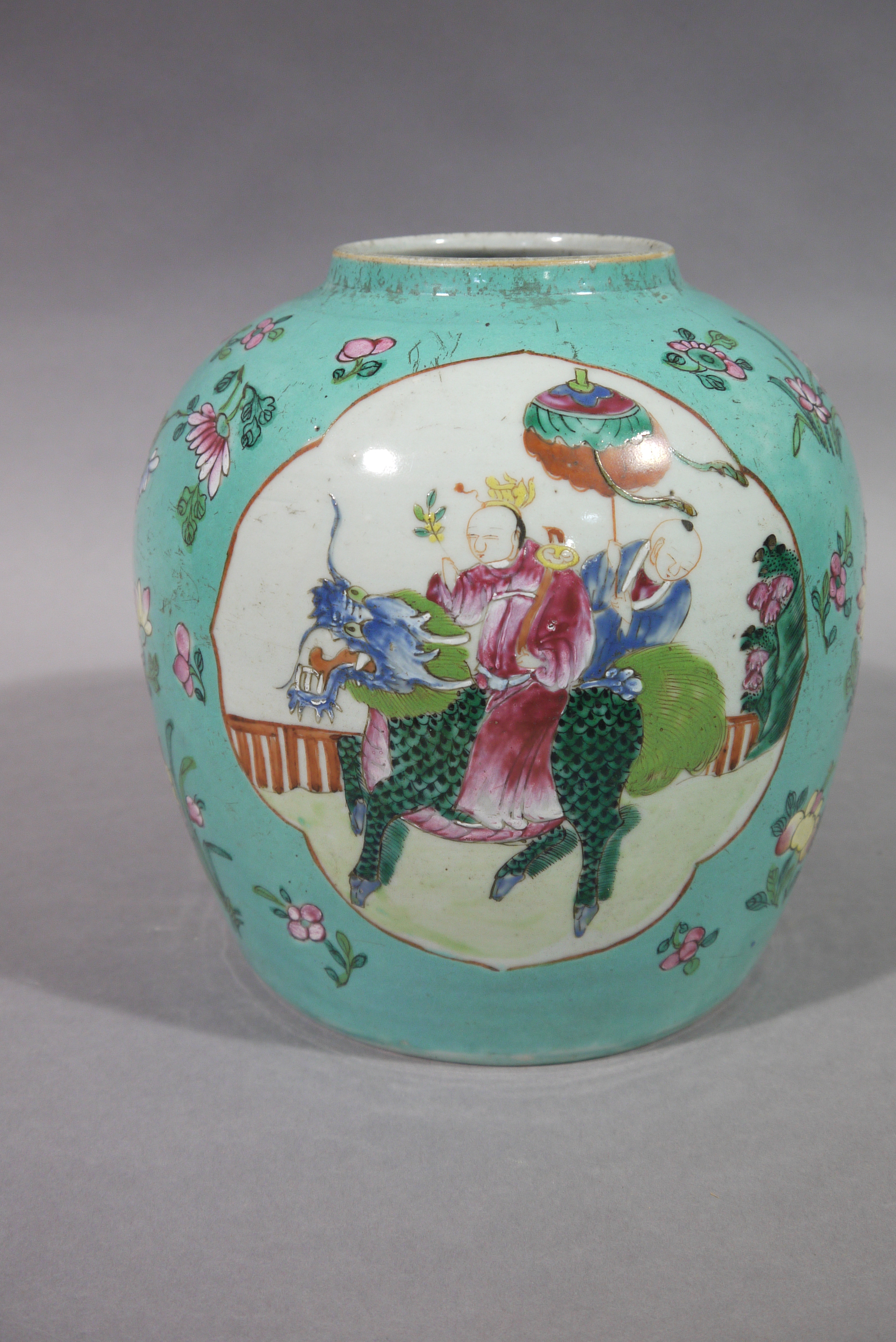 A Chinese famille rose jar decorated with a pair of panels, - Image 2 of 2