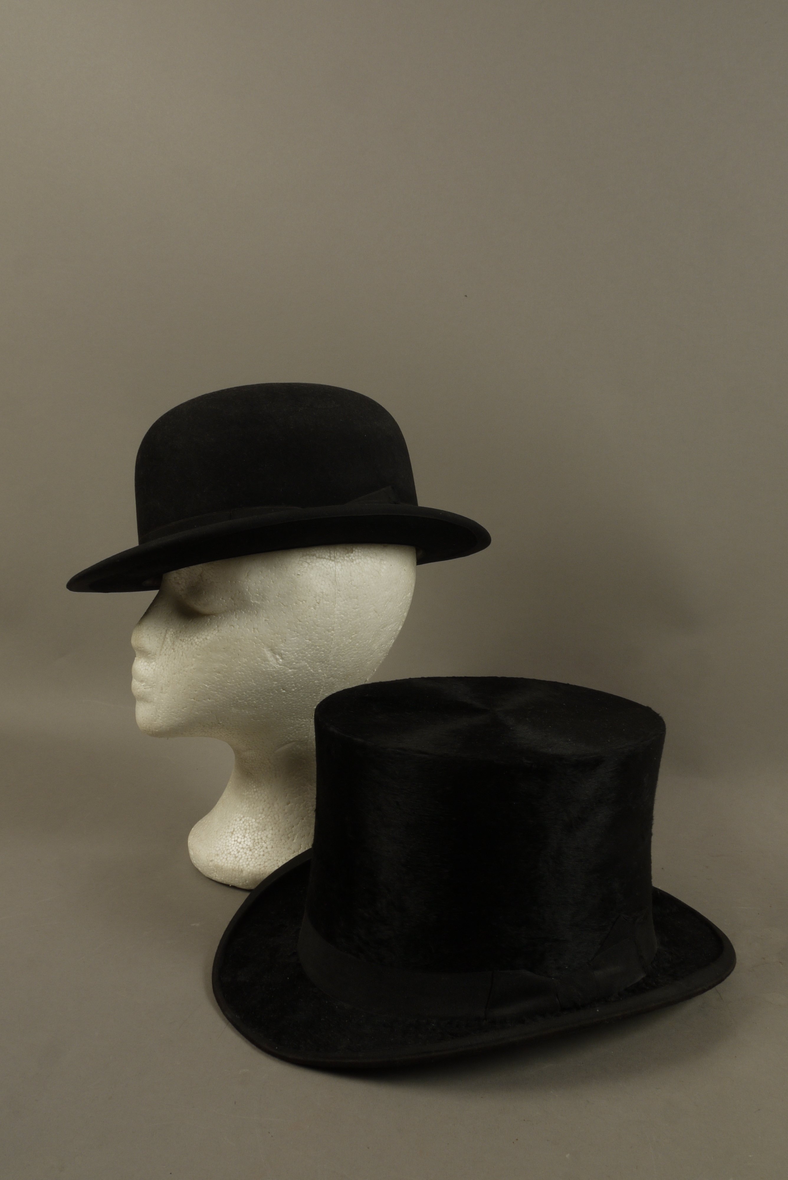 A Ceres fur felt bowler hat size 6 3/4; a best quality own make top hat,