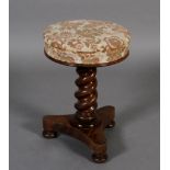 A Victorian rosewood revolving piano stool,