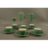 A Poole pottery New Forest pattern tea service for six, comprising a tea pot, milk jug,