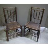 A pair of 19th century elm spindle back single chairs,