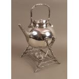 A late Victorian silver plated tea kettle on stand by Walker & Hall,