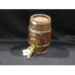 An Old Barrel Form Lockable Money Box