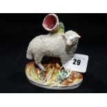 A Staffordshire Pottery Spillholder Group Modelled As A Lamb