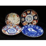 Three Circular Imari Decorated Plates Together With A Pair Of Blue And White Transfer Decorated
