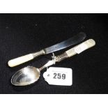 A Mother Of Pearl Handled Preserve Spoon And Butter Knife