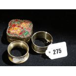 Two Silver Serviette Rings Together With An Enamel Decorated Trinket Box