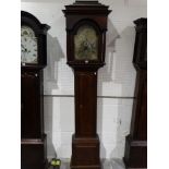 An Antique Oak Encased Long Case Clock The Stepped Hood Enclosing An Arched Brass And Silvered