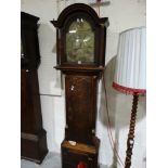 An Antique Oak Encased Long Case Clock The Arch Brass Dial With Eight Day Movement, Signed Baddely