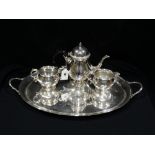 A Three Piece Plated Tea Service On A Similar Two Handled Tray