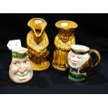 Two Treacle Glazed Staffordshire Pottery Toby Jugs And Two Others