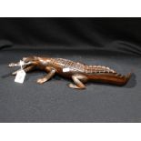 A Carved Lignum Vitae Model Crocodile, 18" Long