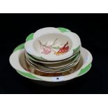 A Seven Piece Royal Doulton Floral Decorated Pottery Dessert Service