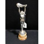 A Chrome Plated Art Deco Period Mascot For Featherlite Tyres