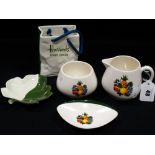 Six Pieces Of Carlton Ware Pottery To Include A Harrods Food Halls Bag Vase
