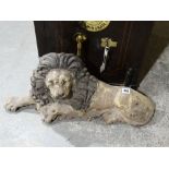 A Cast Metal Model Of A Recumbent Lion (Possibly A Bank Or Insurance Company Piece)