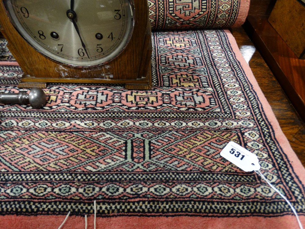 A 20th Century Pink Ground Patterned Rug