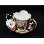 A Porcelain Two Handled Cabinet Cup & Saucer With Alternate Floral & Figural Panels, Augustus Rex