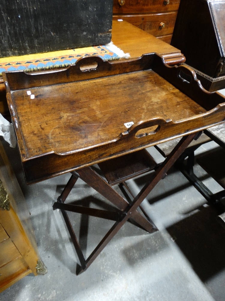 An Antique Butlers Tray On Folding Stand