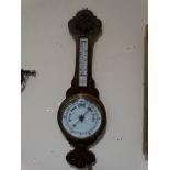 An Oak Framed Wall Barometer