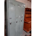 A Vintage Three Door Metal Locker