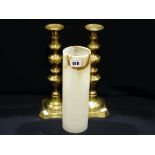 A Pair Of Antique Brass Candle Holders Together With An Alabaster Vase