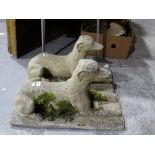 A Pair Of Composite Garden Models Of Seated Hounds